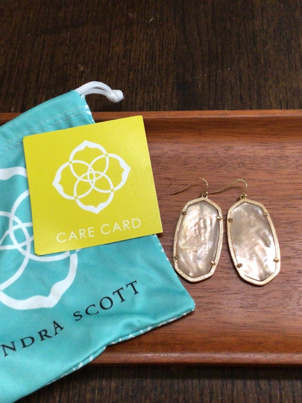 Kendra Scott Danielle earrings with ivory mother of pearl, care card & bag